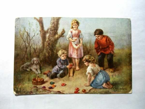 Кошелев дети катающие пасхальные яйца