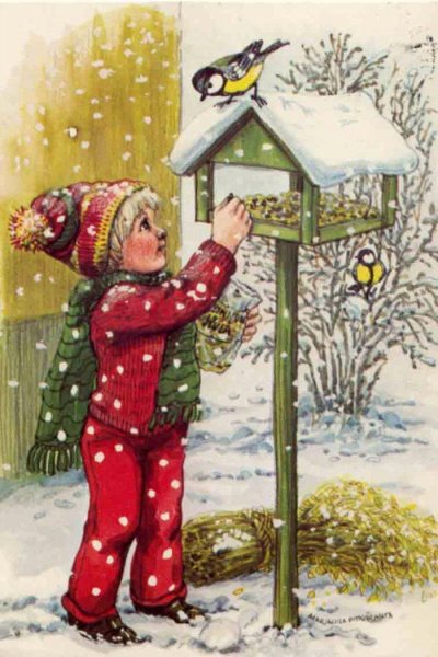 Дети кормят птиц зимой