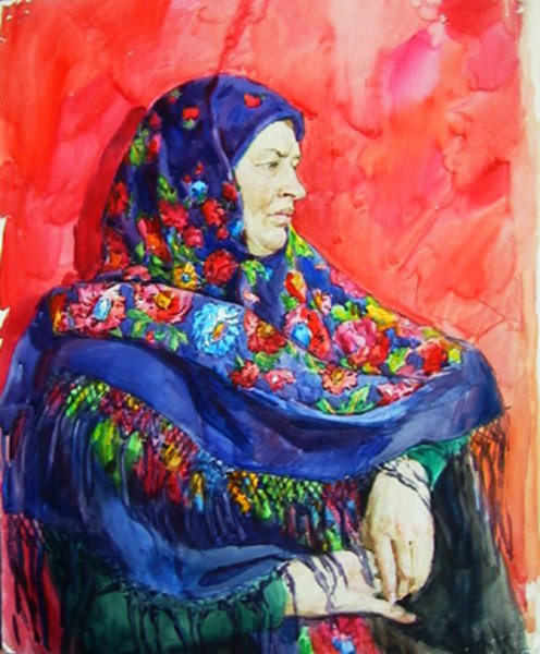 Красивая женщина в голубом платке