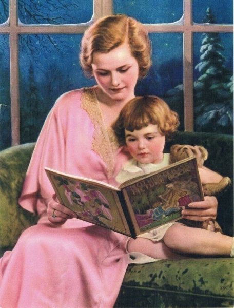 Мама читает книгу ребенку