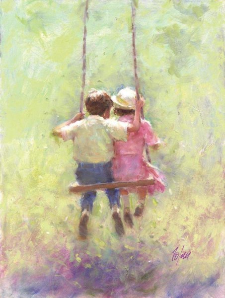 Мальчик и девочка на качелях