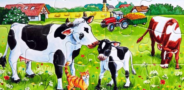 Корова с теленком на лугу