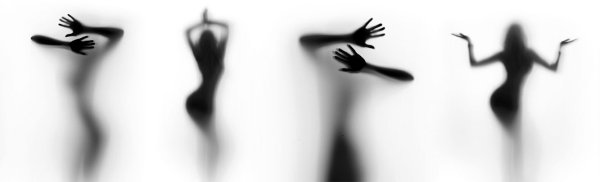 Женский силуэт за стеклом