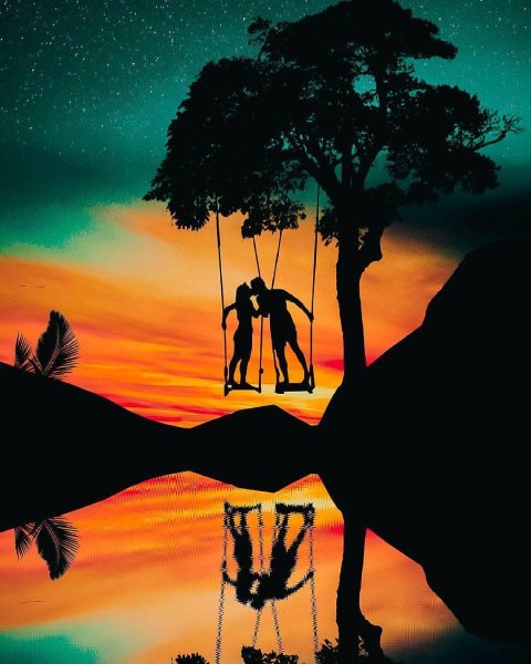 Влюбленная пара на качелях