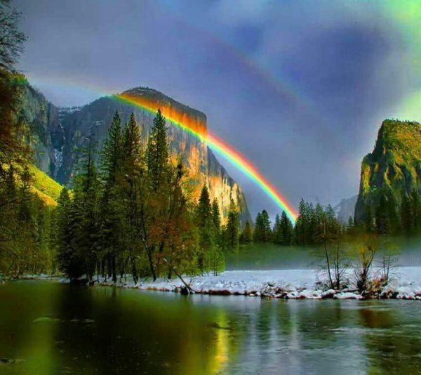 Горные пейзажи с радугой