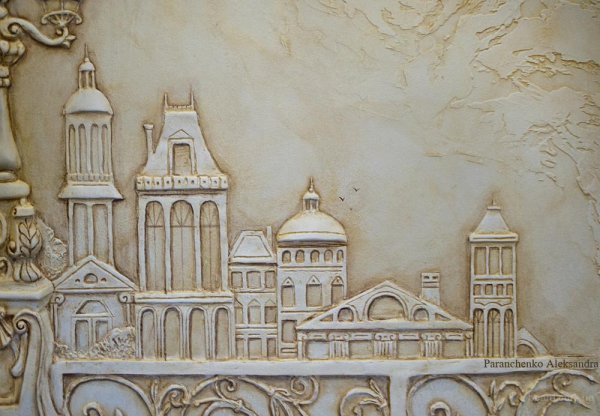 Барельеф на стене город