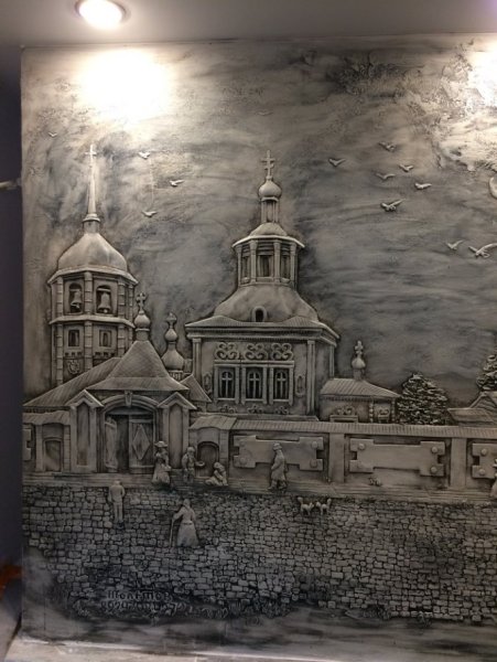 Барельеф на стене Церковь