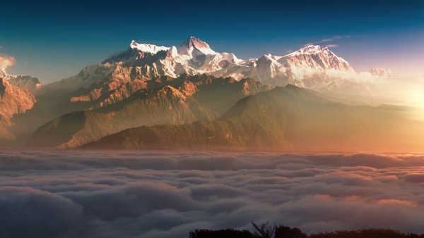 Горы облака солнце