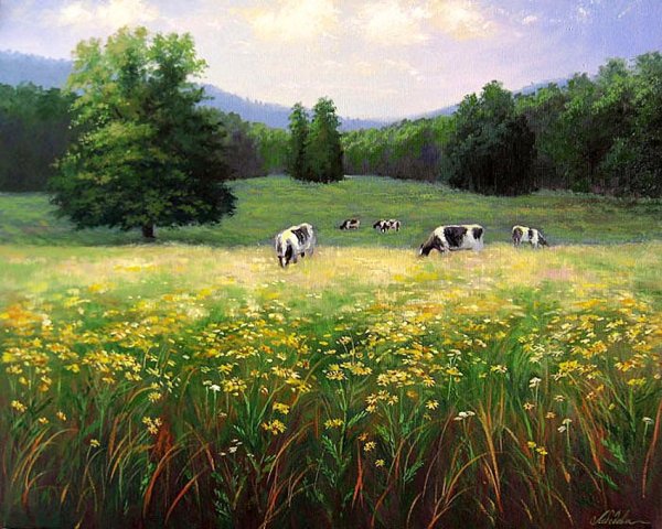 Корова с теленком на лугу