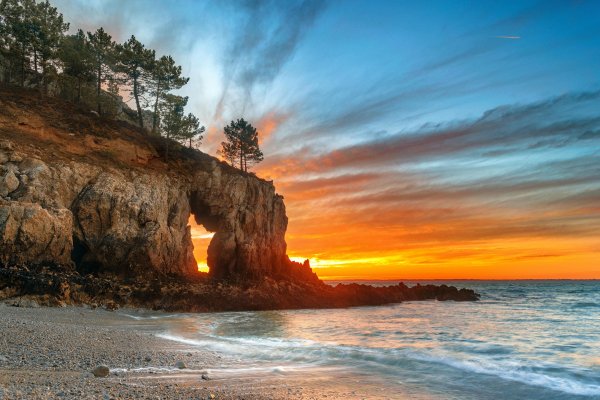 Океан скала арка залив