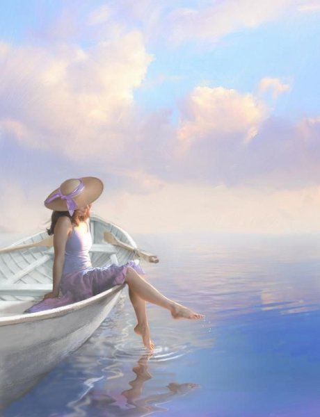 Девушка сидит на скале