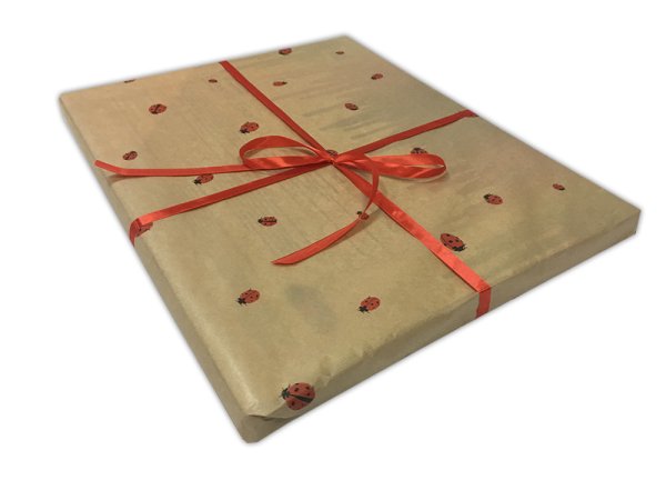 Упаковка холста в подарочную бумагу