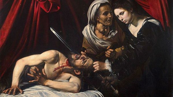 Юдифь обезглавливающая Олоферна Караваджо