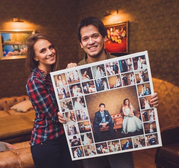 Холст с фотографией в руках