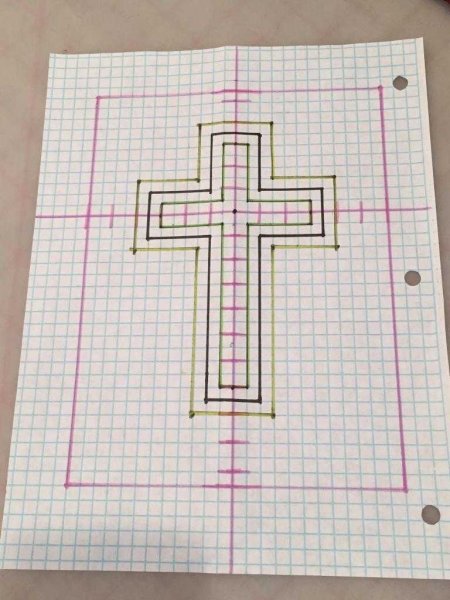 Крест в тетради в клетку