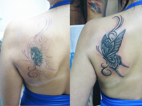 Перекрытие старого тату на спине