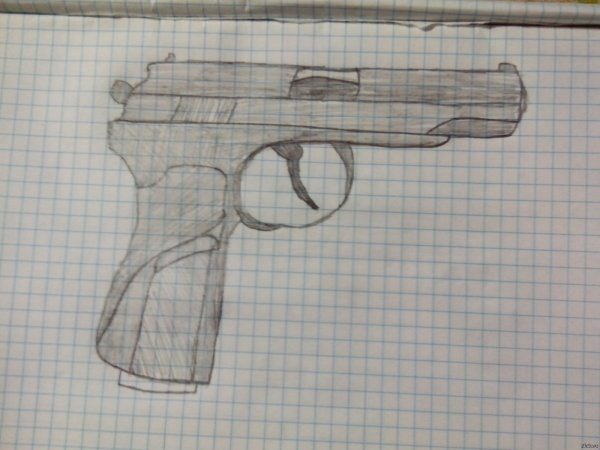 Пистолет на клеточном листе