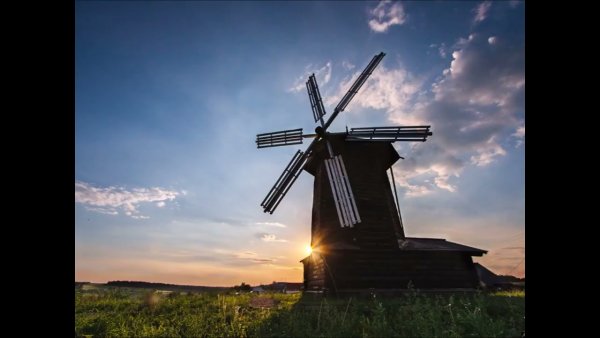 Зонт одуванчика в небе