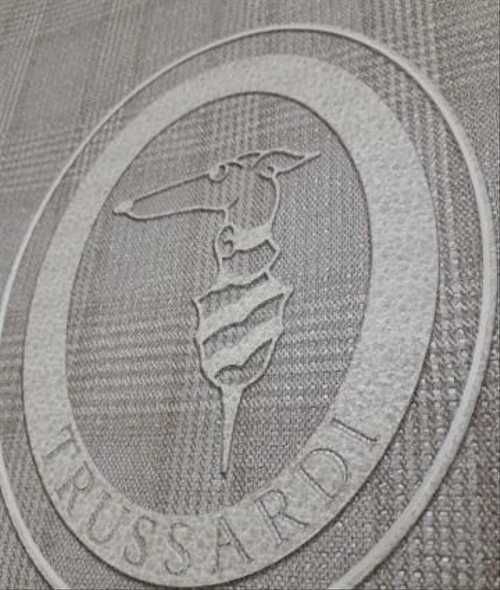 Знак Труссарди фото