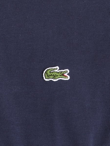 Lacoste логотип