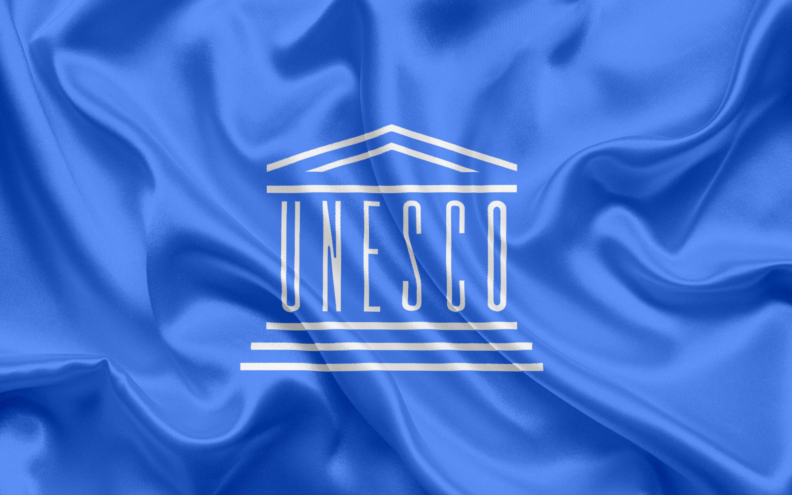 Unesco org. ЮНЕСКО Международная организация. ООН по вопросам образования науки и культуры ЮНЕСКО. ЮНЕСКО эмблема. Флаг ЮНЕСКО.