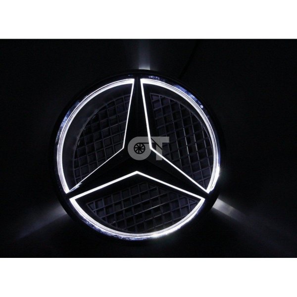 Значок Мерседес на сером фоне