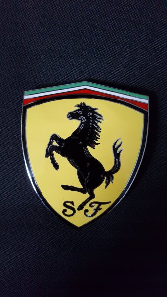 Феррари значок