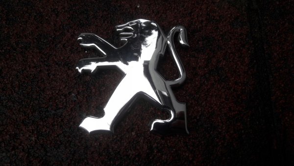 Новая эмблема Пежо