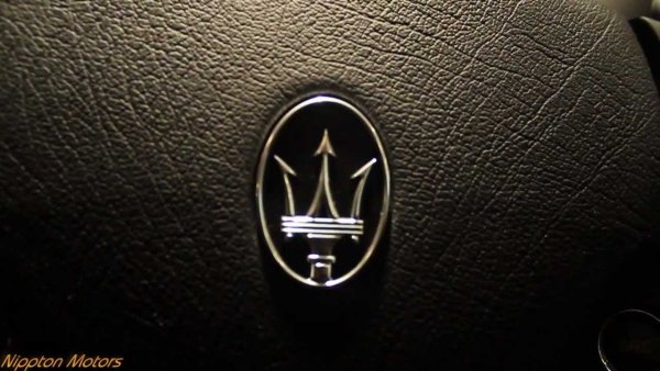 Обои Maserati логотип