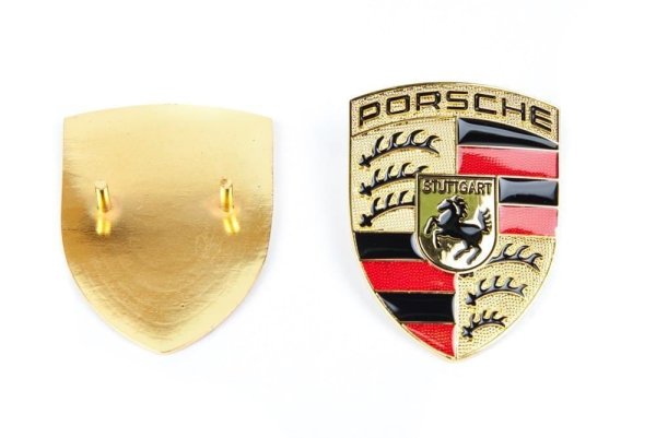Порше значок