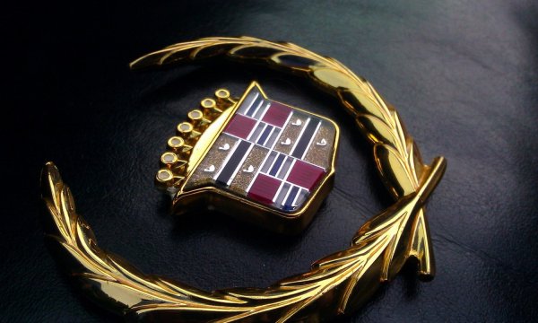 Кадиллак знак