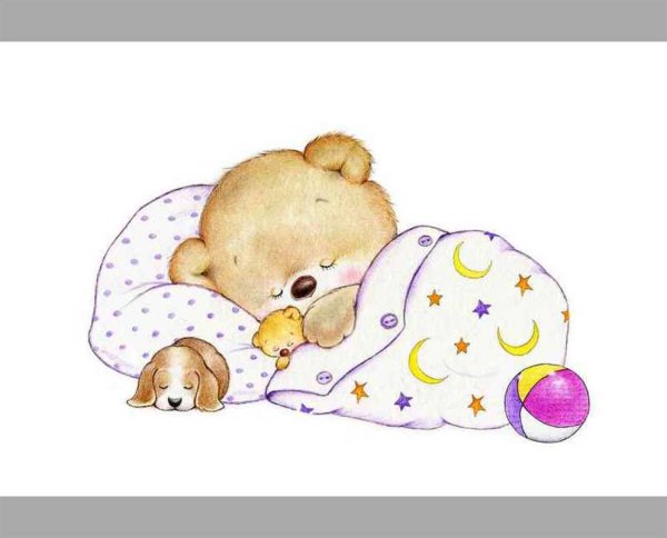 Медвежонок спит в кроватке