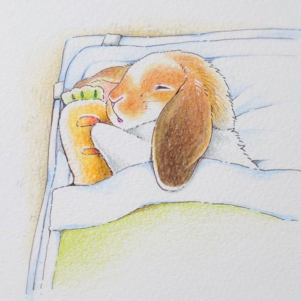 Кролик спит в кроватке