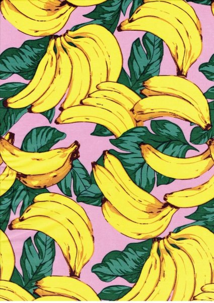 Банан на розовом фоне