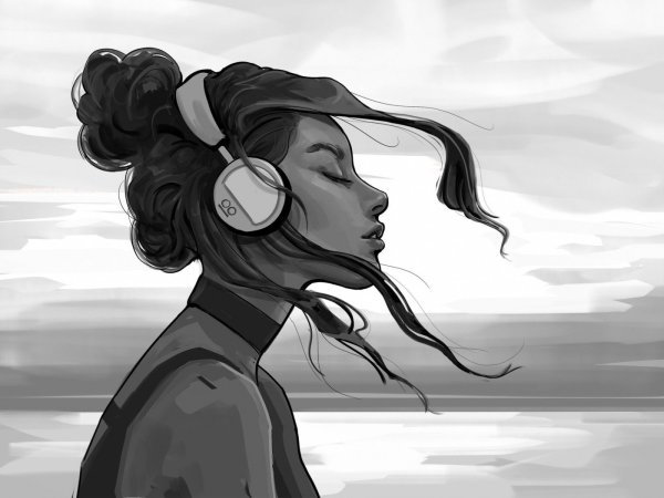 Грустная девушка в наушниках