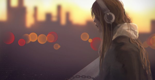 Грустная девушка в наушниках