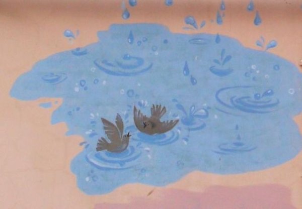 Ребенок в луже