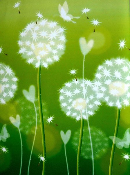 Одуванчик на зеленом фоне