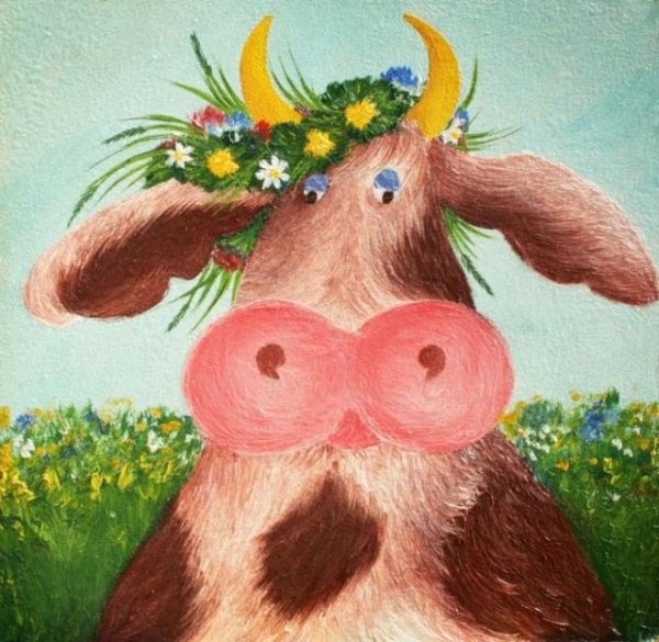 Корова с венком на голове