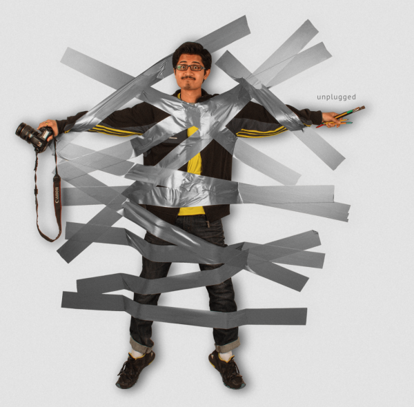 Человек скотчем к стене