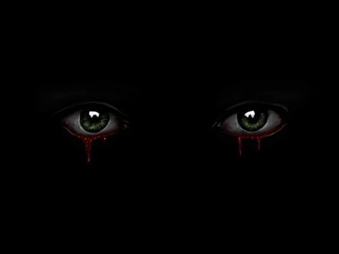 Страшные глаза на черном фоне