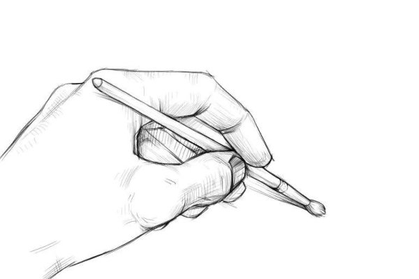 Рука держит карандаш