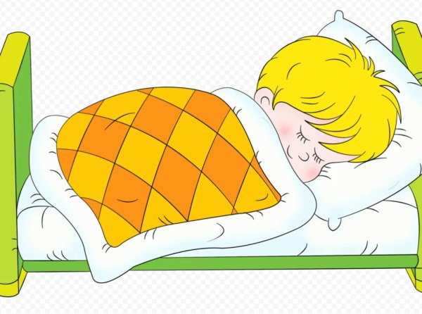 Мальчик спит в кровати