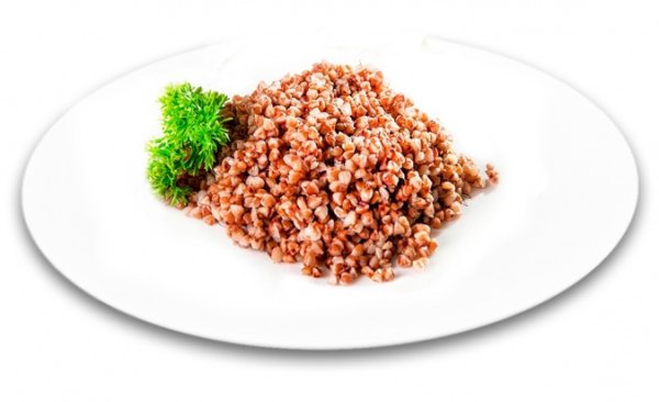 Гречка гарнир на белой тарелке