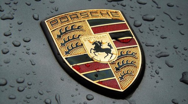 Порше значок