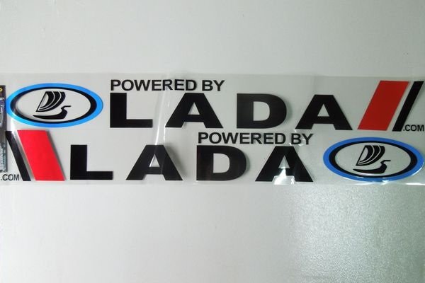 Наклейка Лада на дверь