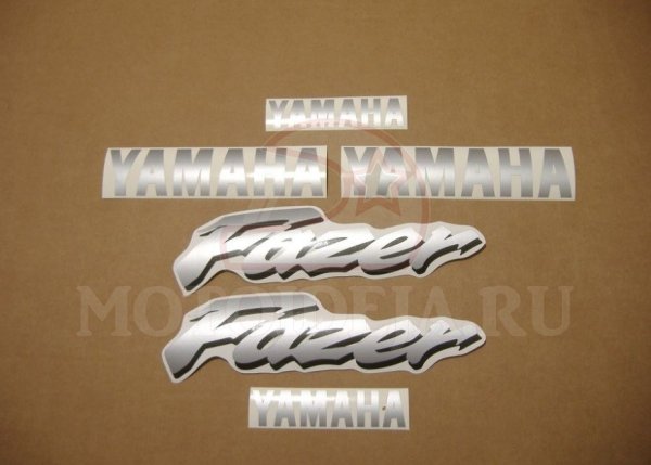 За рулем мотоциклист наклейка