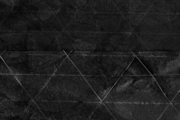 Старая потертая черная бумага