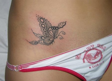 Интимное тату женское на лобке