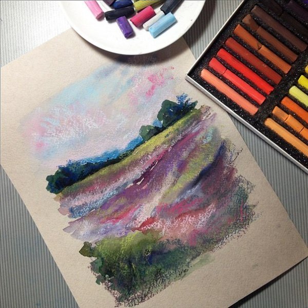 Художник рисует мелками